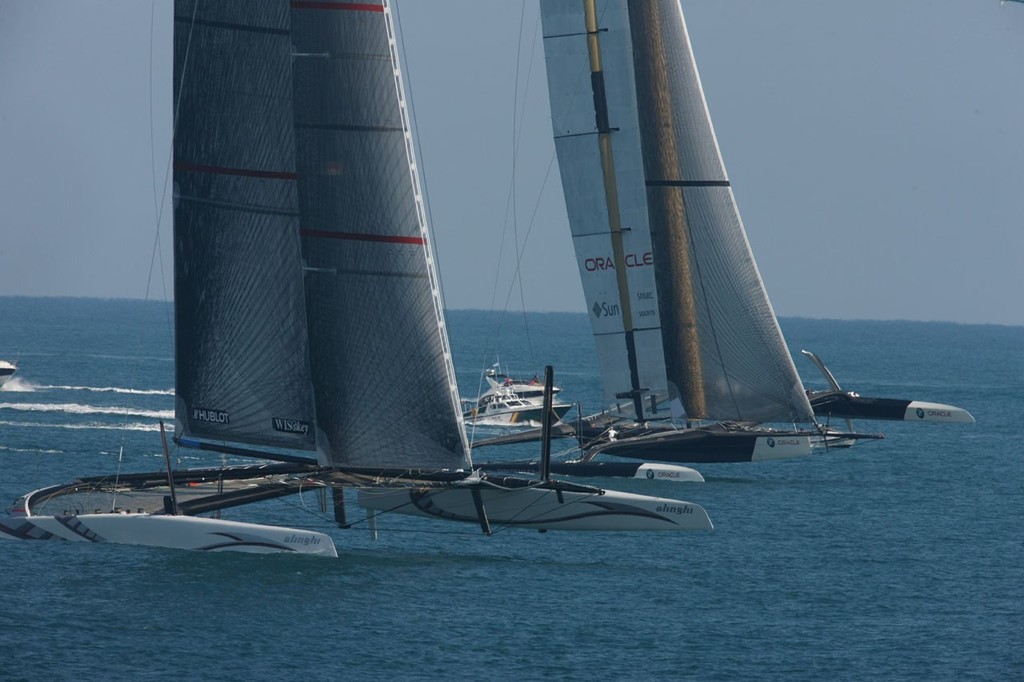 USA-17  chases hard after Alinghi 5, Race 1 of the 33rd America’s Cup - photo © BMW Oracle Racing Photo Gilles Martin-Raget <a target=